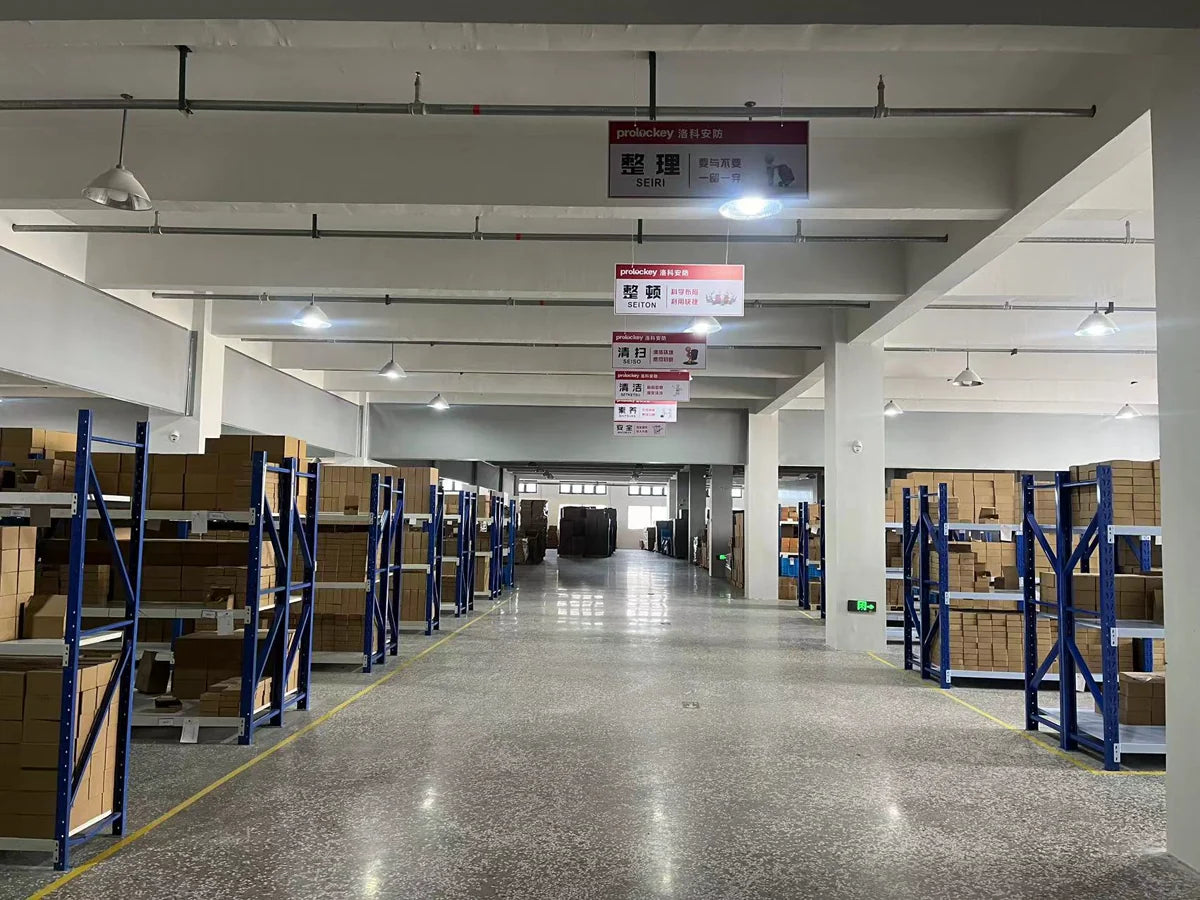Organized warehouse aisle at the PROLOCKEY manufacturing base