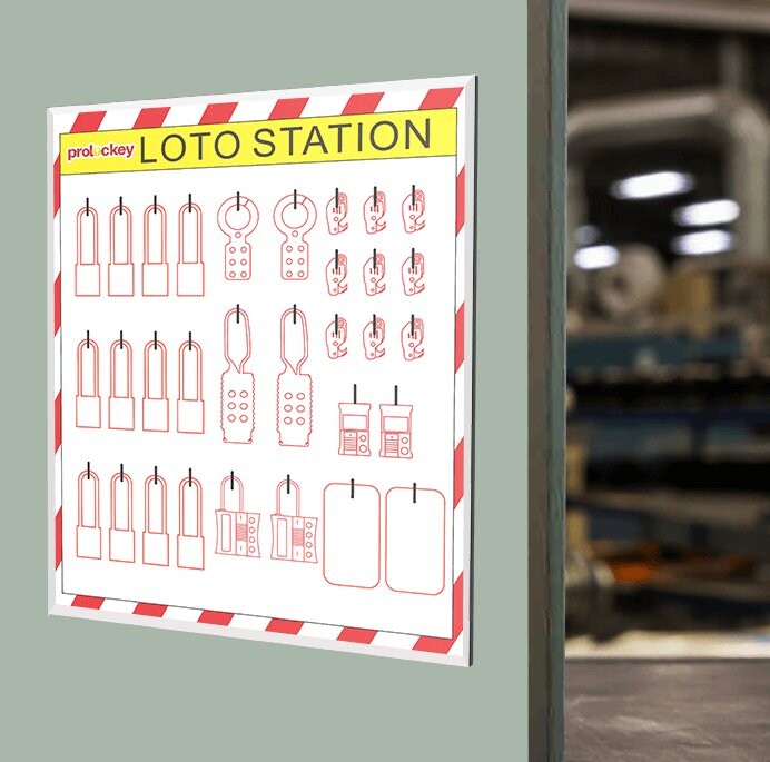 Custom lockout station board installed beside industrial equipment